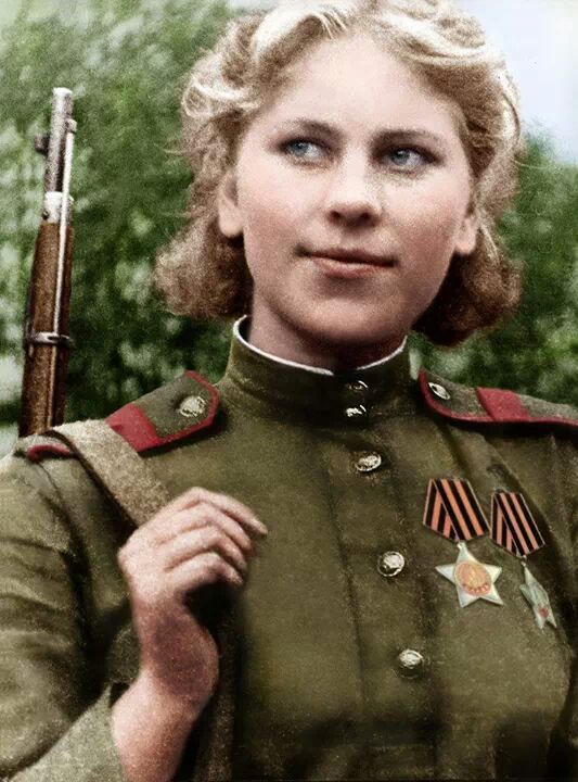 Colorized Photo of Roza Shanina posed, displaying two medals